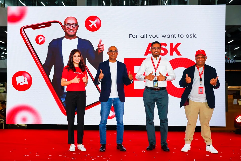 Capital A CEO Tony Fernandes (far right) with company executives at the launch of AirAsia's new artificial intelligence concierge. Fernandes expects a boost to business when China removes certain Covid testing requirements for travellers.