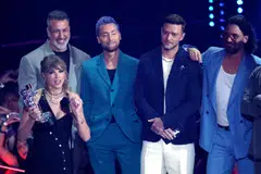 (From left) Taylor Swift receives the Best Pop award from NSYNC's members Joey Fatone, Lance Bass, Justin Timberlake and JC Chasez during the 2023 MTV Video Music Awards at the Prudential Centre in Newark, New Jersey, on Sep 12, 2023. 
