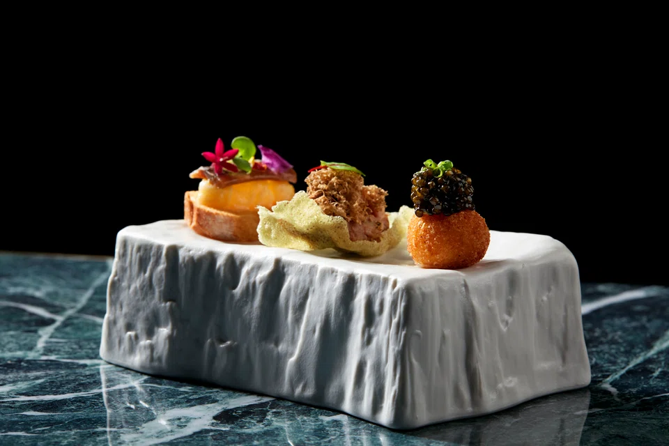 Start off with a trio of snacks.