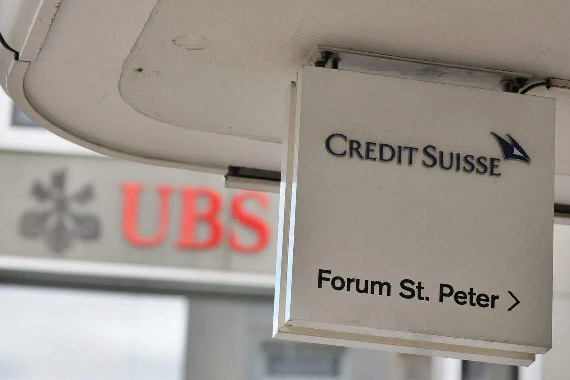 Logos of Swiss bank UBS and Credit Suisse in Zurich, Switzerland 