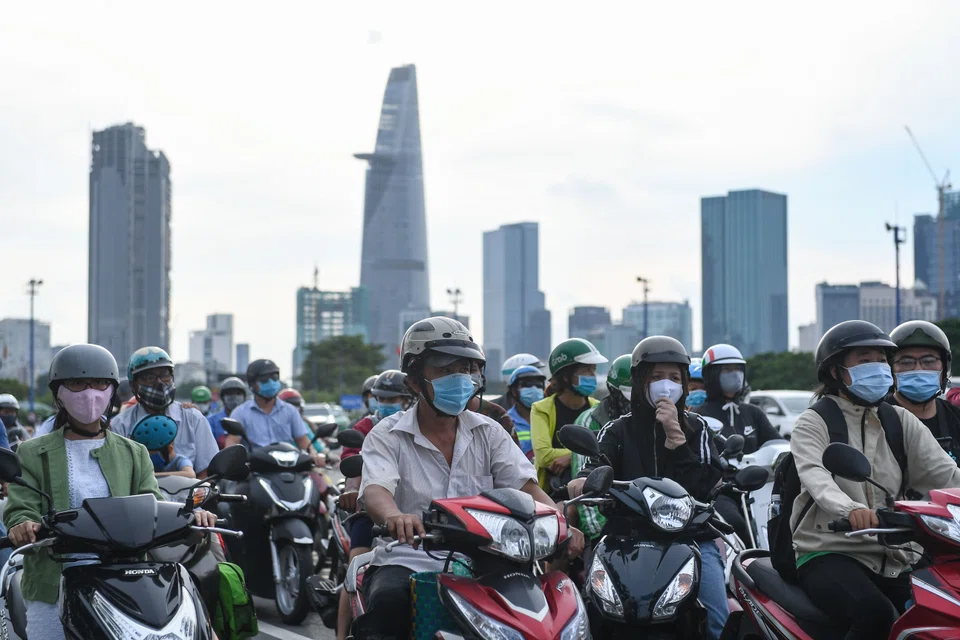 Motorists in Ho Chi Minh City. Vietnam is 1 of only 7 Asian countries that had a tax-to-GDP ratio equal to or above that of the Asia-Pacific average of 19.1 per cent in 2020.