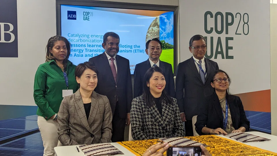 Front row (from left): Global Energy Alliance for People and Planet's (GEAPP) vice-president Kitty Bu, Monetary Authority of Singapore (MAS) chief sustainability officer Gillian Tan and the Asian Development Bank (ADB) vice-president for sectors and themes Fatima Yasmin.  Back row (from left): GEAPP's chief partnerships officer Sundaa Bridgett-Jones, MAS managing director Ravi Menon, ADB's president Masatsugu Asakawa and Indonesia's Energy and Mineral Resources Minister Arifin Tarif.