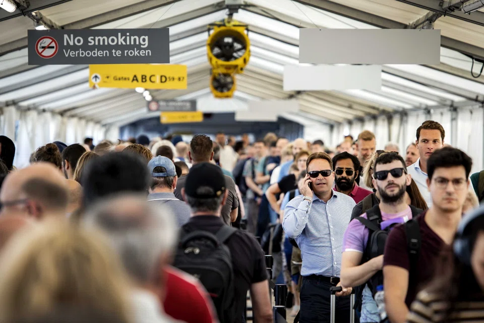 Schiphol Airport has been plagued by long queues and baggage handling issues.