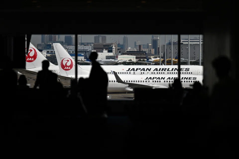 A resurgence of the virus in Japan has slowed reservations for domestic flights, but factors including robust demand for international flights continue to support the positive outlook, ANA and JAL executives said.