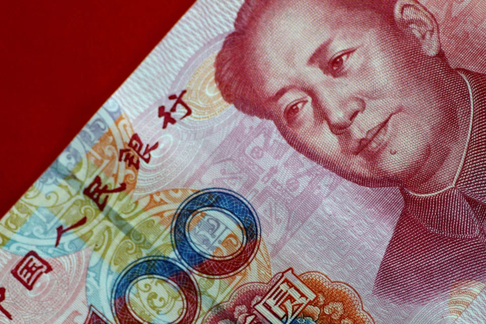 CHINA'S yuan bounced on Friday (May 20) to finish the domestic session at a two-week high against the US dollar, on track for its biggest weekly gain in 17 years.