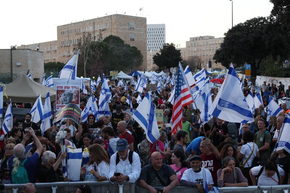 Anti-government protesters attend a second day of protests outside the Knesset, the Israeli Parliament in Jerusalem, Israel, April 1, 2024. 