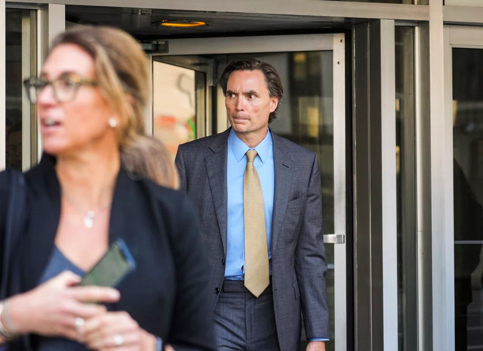 Former Uber security chief Joseph Sullivan (centre) was found guilty by a jury in federal court on charges that he did not disclose a breach of customer and driver records to government regulators.