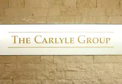 Carlyle’s downsizing comes as private equity firms struggle to cash out on their assets amid volatility caused by conflicts in the Middle East and Europe, rising inflation and higher interest rates.