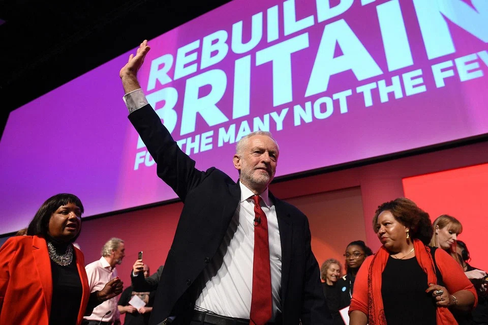 A worker assembling a vehicle at a factory in Qingzhou, Shandong  on Sep 28, 2021.