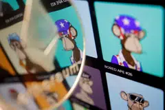 FILE PHOTO: A representation of cryptocurrency Ethereum is seen next to non-fungible tokens (NFTs) of Yuga Labs "Bored Ape Yacht Club" collection displayed on its website, in this illustration picture taken March 24, 2022. REUTERS/Florence Lo/Illustration/File Photo