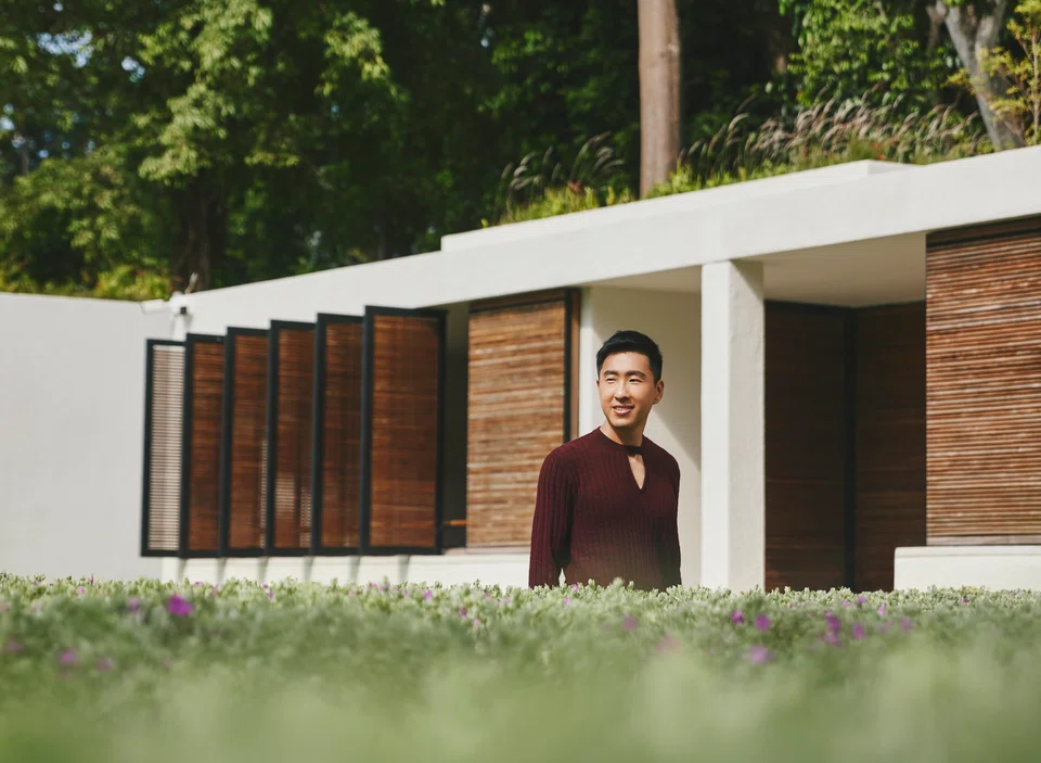 Bino Chua in Fendi knitted pullover and trousers.