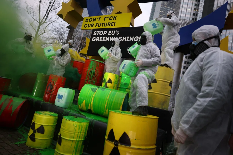 Demonstrators protesting against the greenwashing of nuclear energy and gas through the taxonomy of the European Union (EU) in Frankfurt, Germany. The EU has launched new rules on corporate sustainability reporting, which include more detailed reporting on issues such as environmental rights. 