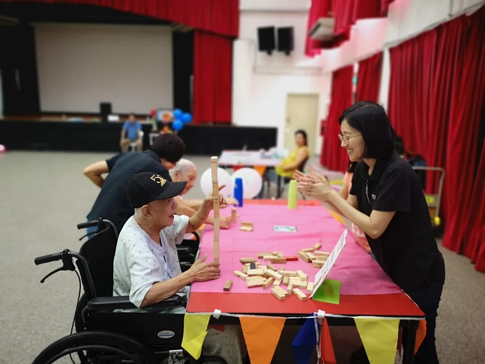 Agilent Technologies Singapore's staff volunteered at a seniors' home during National Day in 2019.