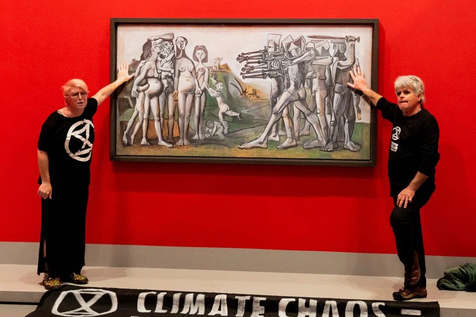 The protesters were “removed from the painting” more than an hour after their action was believed to have started.