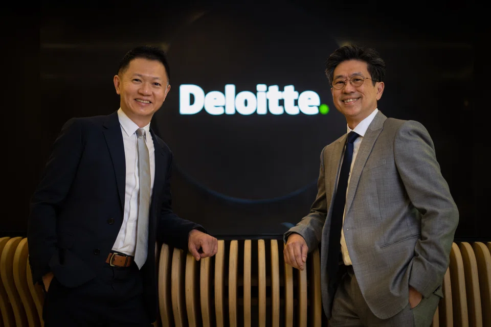 Eugene Ho (left) has over 28 years of management consulting experience; Philip Yuen is also the chairman of Deloitte Singapore. 