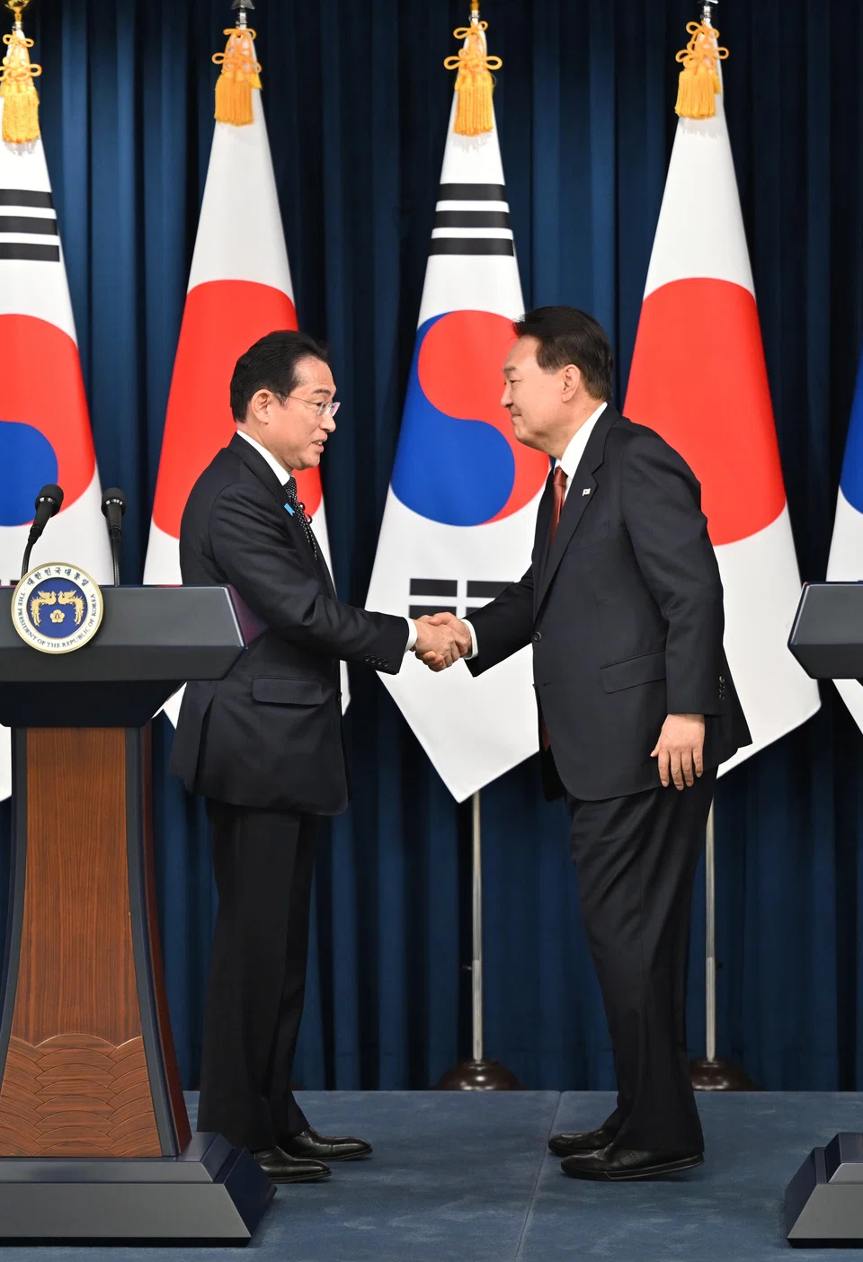 Japanese Prime Minister Fumio Kishida (left) with South Korean President Yoon Suk-yeol during a joint press conference following their meeting at the presidential office in Seoul on May 7.  Kishida's visit marked the first formal summit in the South Korean capital between the neighbours in a dozen years.
