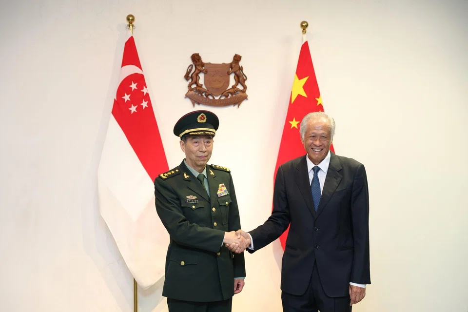 Li Shangfu, China's minister of defence, left, meeting Ng Eng Hen, Singapore's defence minister, in Singapore in June.  Rahm Emanuel, the US ambassador to Japan, stated on social media that Li “hasn’t been seen or heard from in 3 weeks,” and that the minister might have been placed under house arrest.