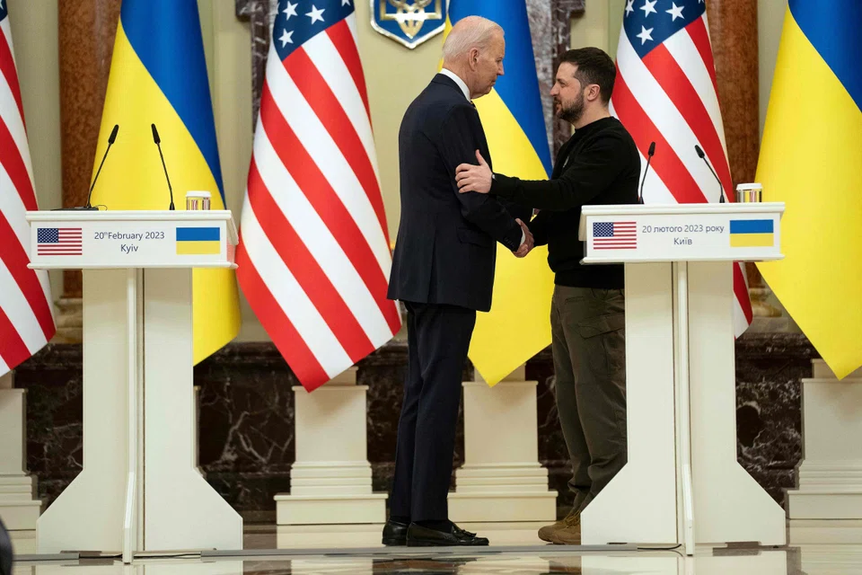 US President Joe Biden (L) and Ukrainian President Volodymyr Zelensky (R) as they attend a joint press conference in Kyiv, on Feb 20, 2023. This was a “historic visit, unprecedented in modern times” into a country at war where there are no US forces on the ground.