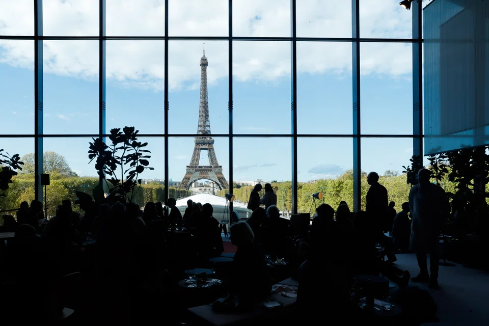 A view of the Eiffel Tower from the VIP lounge at the Paris+ par Art Basel art fair in Paris on Oct 22, 2022. 