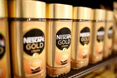 Jars of Nescafe Gold coffee by Nestle in a supermarket at the Nestle headquarters in Vevey, Switzerland. The company plans to make infant products and ready-to-drink coffee at its plant in Saudi Arabia.  