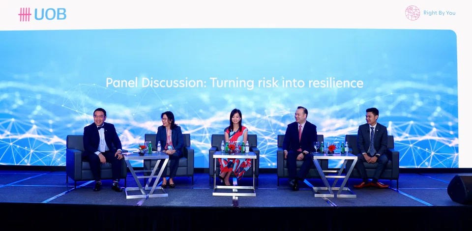 (From left) Mr Heng Koon How, Head, Markets Strategy, UOB; Ms Angelia Lim, Chief Financial Officer (Asia Pacific), Lasalle Investment Management; Ms Beh Siew Kim, Chief Financial & Sustainability Officer (Lodging), CapitaLand Investment Limited; Mr Lim Chern Yuan, Group Chief Executive Officer, Yinson Group; Mr Peter Chia, Senior FX Strategist, UOB. They were speaking at a panel discussion at the Global Markets Economic Forum 2023 on 11 Jan 2023.