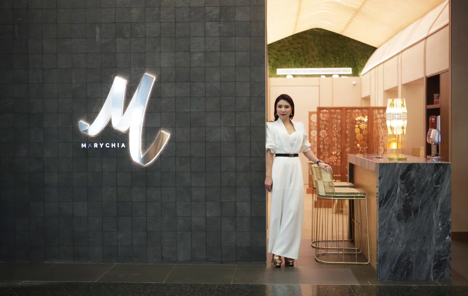 Due to Monsoon Hairdressing’s “persistent inability to meet its financial obligations in a timely manner”, M2 group, the wholly-owned unit of Mary Chia Holdings, will stop allocating further capital to the business to safeguard its own financial stability, said the company on Monday (Oct 30). Above: Wendy Ho, CEO of Mary Chia Holdings, and daughter of the founder, Mary Chia.