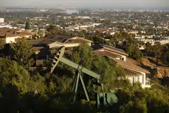 Brent crude settled down 1 cent to US$90.64 a barrel while US West Texas Intermediate crude settled down 22 cents to US$87.29 on Monday.