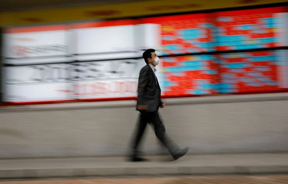 Asia fluctuated after a big sell-off Wednesday, with optimism at a premium among investors and analysts saying it is unlikely to improve anytime soon. 