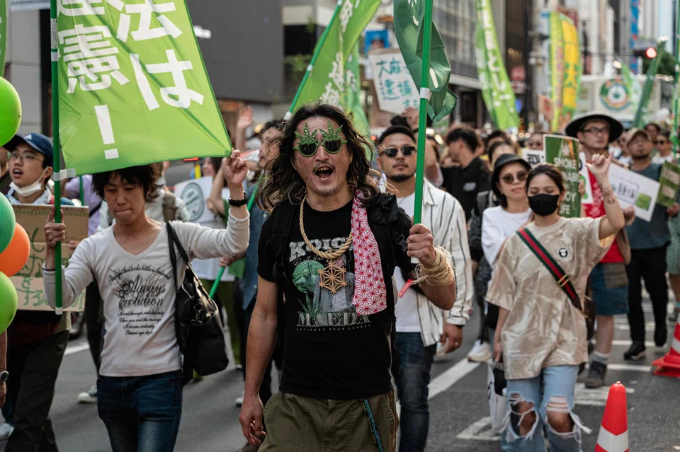 People take part in a march to call for the legalisation of cannabis in the streets of Shibuya in Tokyo on May 4, 2023. Japan has passed a Bill to legalise cannabis-based medicines in a landmark revision of its stringent drug laws.