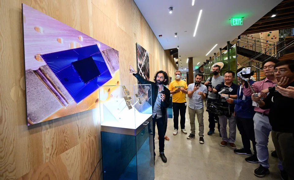 Dr Erik Lucero, lead engineer of Google Quantum AI, leads media on a tour of the Quantum Computing Lab at the Quantum AI campus in Goleta, California on Sept 21, 2022. 