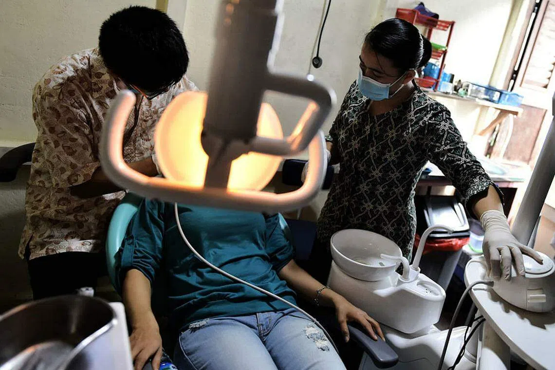 Borneo loggers swop chainsaws for cheap healthcare