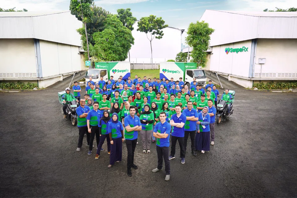 SwipeRx team members, including CEO Farouk Meralli (front, left), at their logistics centre in Indonesia.
