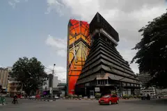 A symbol of Ivorian prosperity in the 1970s and one of the first towers built in the central business district of Plateau in Abidjan, the futuristic pyramid-shaped building has been neglected for years.