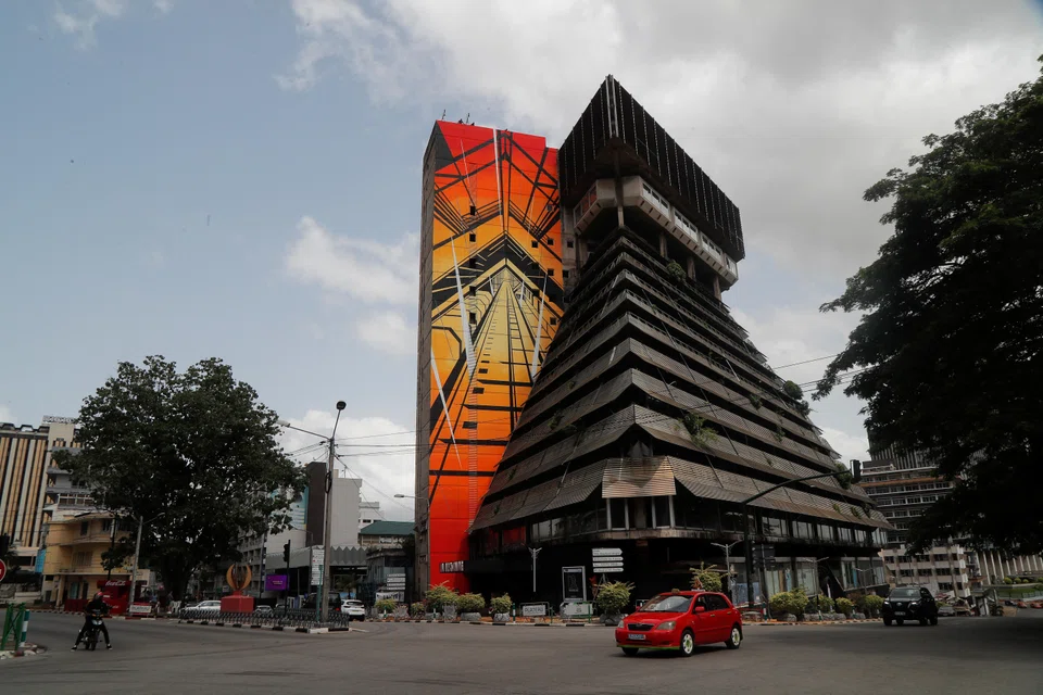 A symbol of Ivorian prosperity in the 1970s and one of the first towers built in the central business district of Plateau in Abidjan, the futuristic pyramid-shaped building has been neglected for years.