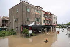 A partially submerged building is seen following heavy rains caused by Typhoon Haikui in Xiamen, in China's southern Fujian province on Sept 6, 2023.