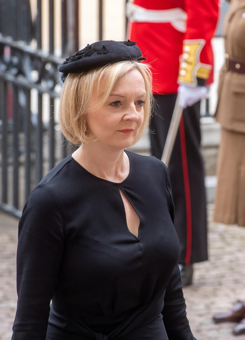 British Prime Minister Liz Truss flew out of London hours after delivering a biblical reading at Monday’s funeral of Queen Elizabeth II, as government mourning ends and UK political life resumes in full speed.
