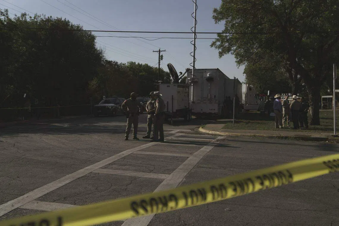 Law enforcement outside Robb Elementary School in Uvalde, Texas, on May 25. 