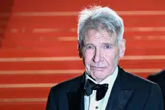 Actor Harrison Ford leaves the Festival Palace after the screening of the film "Indiana Jones and the Dial of Destiny" during the 76th edition of the Cannes Film Festival in Cannes, France, May 18, 2023. 