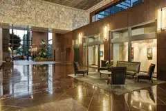 Two of Manulife US Reit's biggest tenants are giving up space at Figueroa, a Grade A office building in Los Angeles..