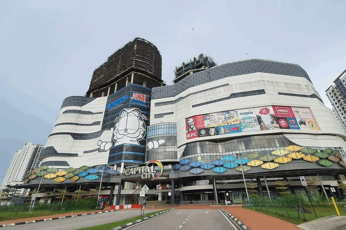 Units of Capital World's shopping centre in Johor, Capital City Mall, were sold to Singapore retailer Mustafa.