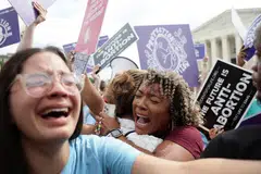 Anti-abortion demonstrators celebrate outside the United States Supreme Court as the court rules in the Dobbs v Women’s Health Organization abortion case, overturning the landmark Roe v Wade abortion decision in Washington on June 24, 2022. 