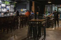 Business at one of BierWax's two locations was so slow that one bartender was told to go, and operating hours were also cut.