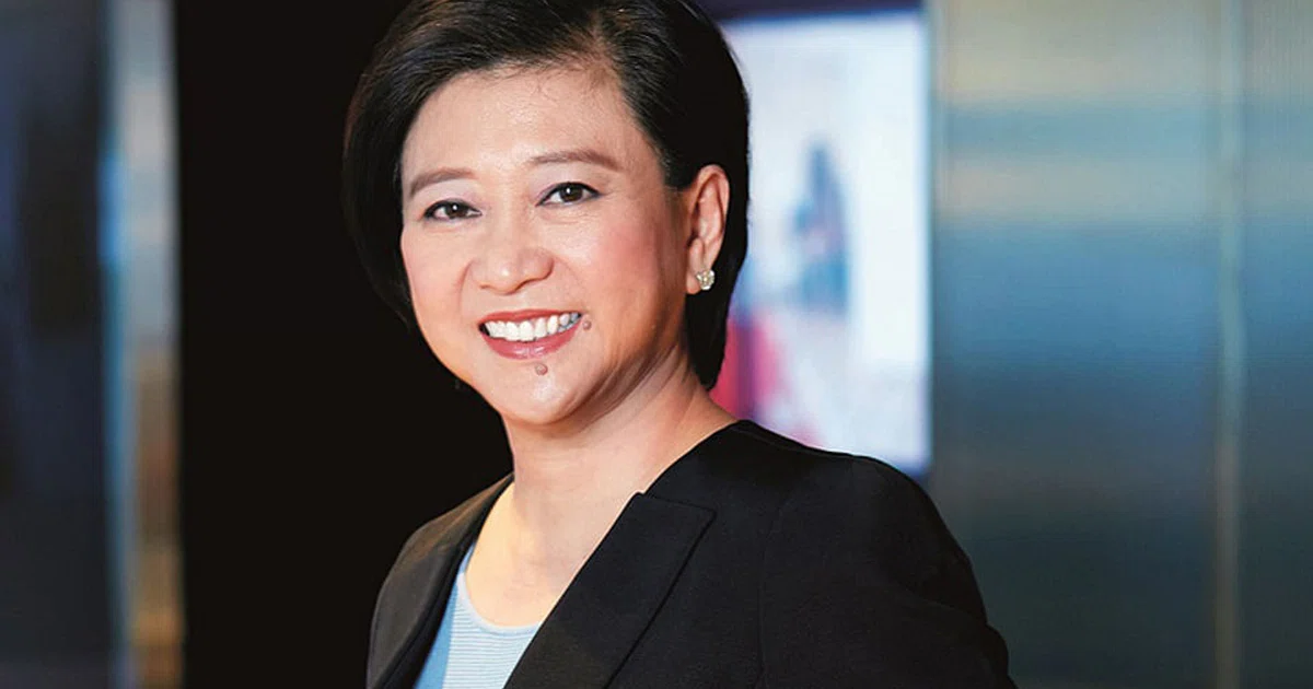Singtel CEO's pay nearly halved to S$3.5m - The Business Times