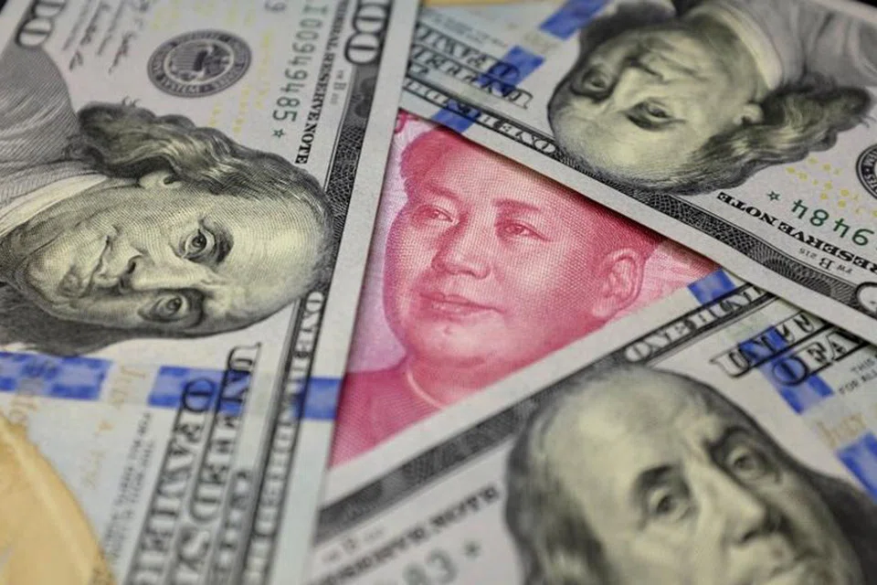 CHINA'S major state-owned banks were actively swapping yuan for US dollars in the onshore forwards market on Tuesday (May 10), 5 banking sources said, pressuring swap points into negative territory for the first time in more than 3 years.