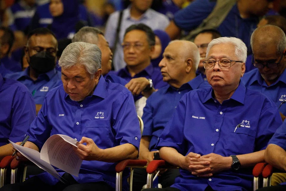 UMNO president Ahmad Zahid Hamidi (left) left out eight ministers and deputy ministers from the candidate list of the Barisan Nasional coalition that the party leads. 