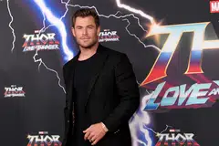 Thor: Love and Thunder stars a muscle-clad, self-parodying Chris Hemsworth as the space viking who wields the mallet Mjolnir.