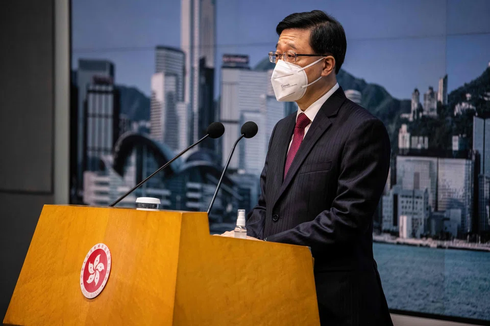 Hong Kong Chief Executive John Lee speaks to the media before an Executive Council meeting in Hong Kong on September 6, 2022. (Photo by ISAAC LAWRENCE / AFP)
