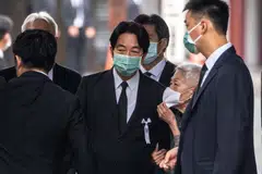 Taiwanese Vice President William Lai (C) attends the funeral of late former Japanese prime minister Shinzo Abe at the Zojoji Temple in Tokyo on July 12, 2022. 