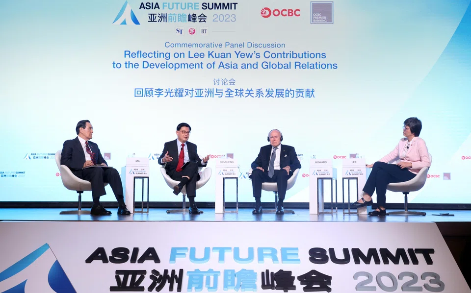 From left: Panellists Ma Ying-jeou, founder and chairman of the Ma Ying-jeou Foundation; Deputy Prime Minister Heng Swee Keat; former Australian prime minister John Howard; and moderator Lee Huay Leng, editor-in-chief of SPH Media's Chinese Media Group at the Asia Future Summit 2023.