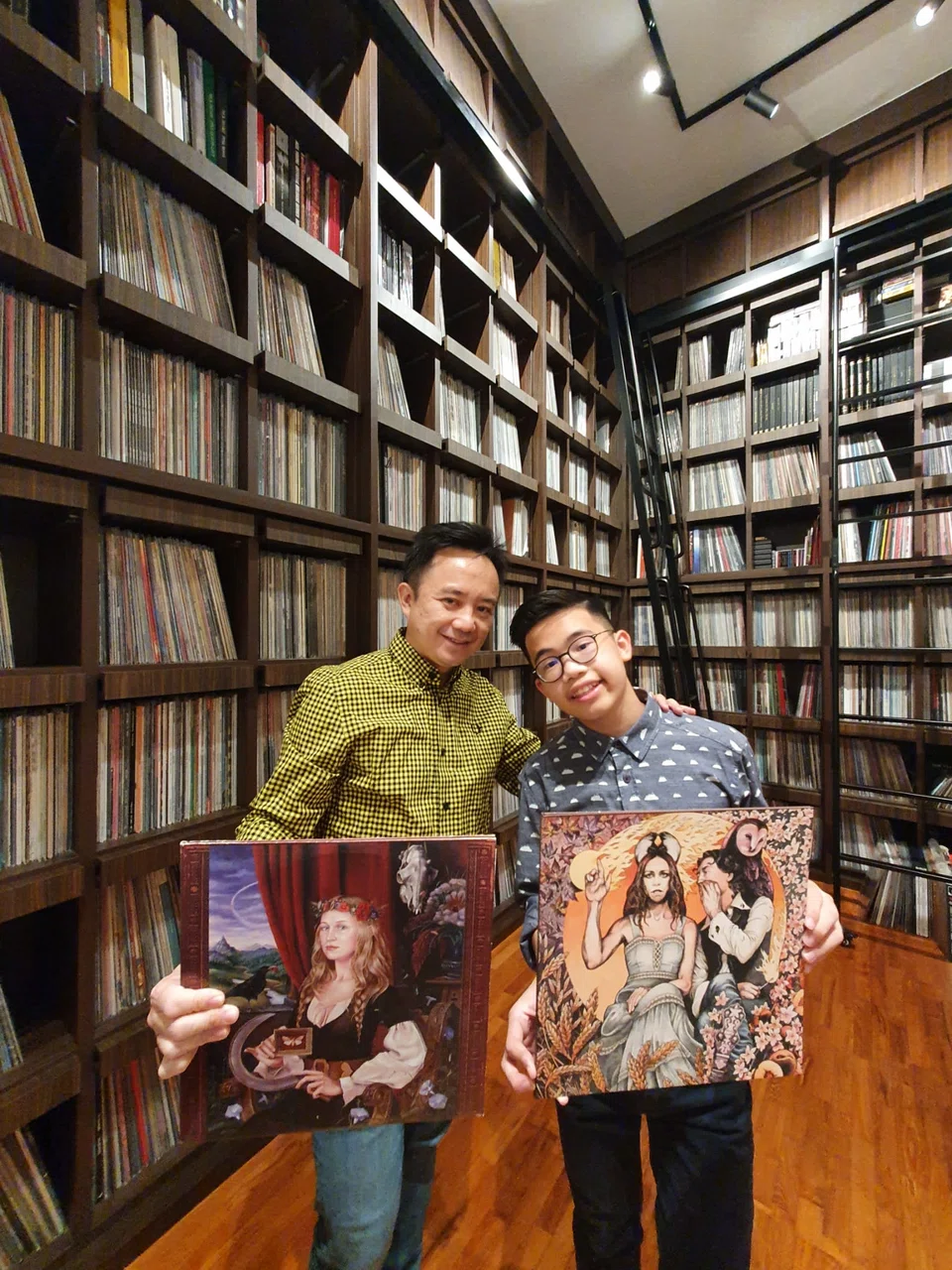 “We might be living in a digital world now where listening to music is so accessible and convenient, but we are surely missing the thrill and excitment of exploring music through a physical medium like vinyl.," says vinyl collector Teo Chee Keong (left), with his son.